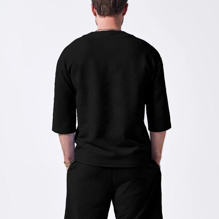 The 2025 new men's summer suit is a casual and versatile solid-color jacquard V-neck short-sleeved T-shirt with two shorts