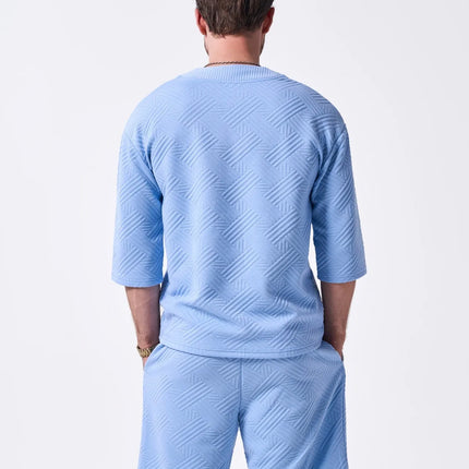 The 2025 new men's summer suit is a casual and versatile solid-color jacquard V-neck short-sleeved T-shirt with two shorts
