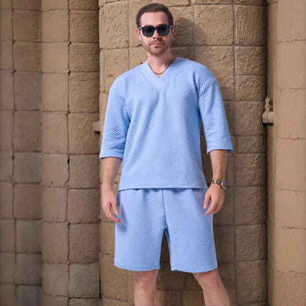 The 2025 new men's summer suit is a casual and versatile solid-color jacquard V-neck short-sleeved T-shirt with two shorts