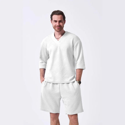 The 2025 new men's summer suit is a casual and versatile solid-color jacquard V-neck short-sleeved T-shirt with two shorts
