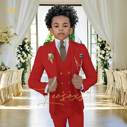 Elegant white 3-piece suit for boys – classic peak lapel tuxedo, suitable for performances and festive attire.