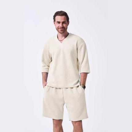 The 2025 new men's summer suit is a casual and versatile solid-color jacquard V-neck short-sleeved T-shirt with two shorts