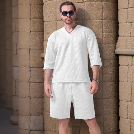 The 2025 new men's summer suit is a casual and versatile solid-color jacquard V-neck short-sleeved T-shirt with two shorts